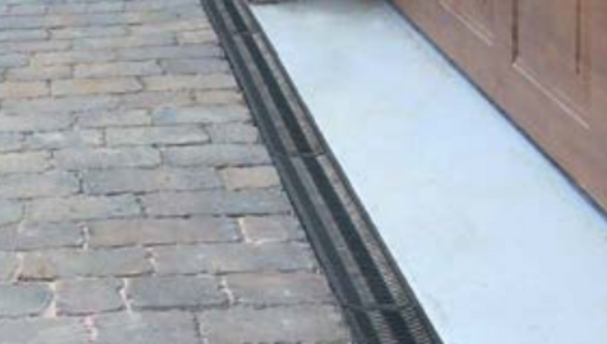 Fernco_lijngoot_afwatering_garagedeur